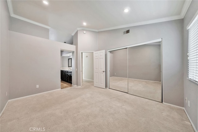 5 Chandon, Laguna Niguel, CA 92677 - unfurnished bedroom with ornamental molding, light colored carpet, a closet, recessed lighting, and connected bathroom