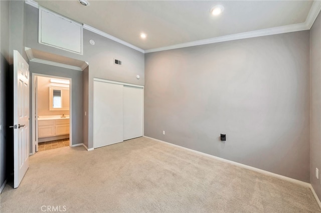 5 Chandon, Laguna Niguel, CA 92677 - unfurnished bedroom featuring light carpet, crown molding, a closet, recessed lighting, and ensuite bathroom