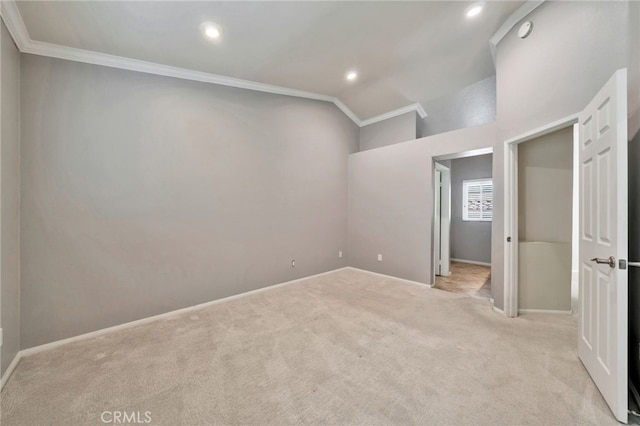 5 Chandon, Laguna Niguel, CA 92677 - unfurnished bedroom with light carpet, crown molding, lofted ceiling, and recessed lighting