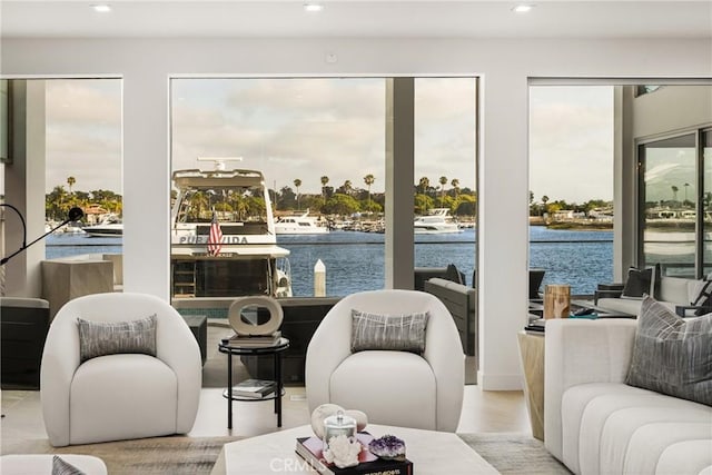 323 Morning Star Ln, Newport Beach, CA 92660 - living room with a water view, recessed lighting, wood finished floors, and plenty of natural light