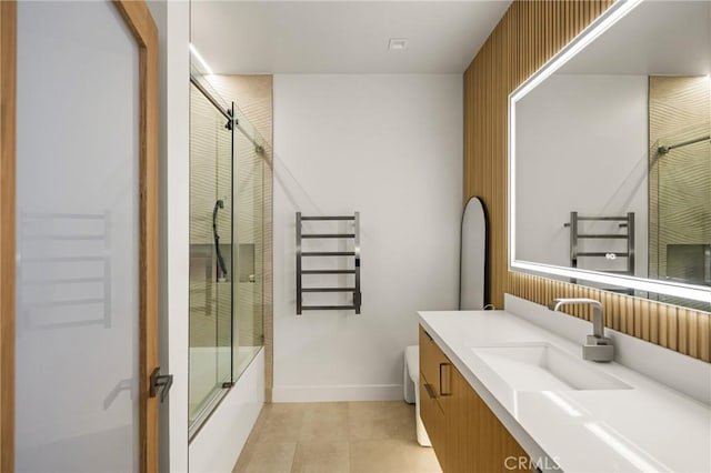 323 Morning Star Ln, Newport Beach, CA 92660 - full bathroom featuring a towel warmer, vanity, shower / bath combination with glass door, and tile patterned floors