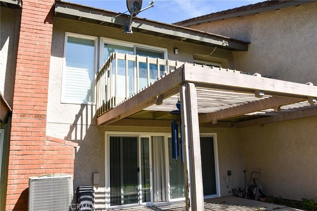 6584 E Paseo Diego, Anaheim, CA 92807 - back of property featuring a balcony, stucco siding, and brick siding