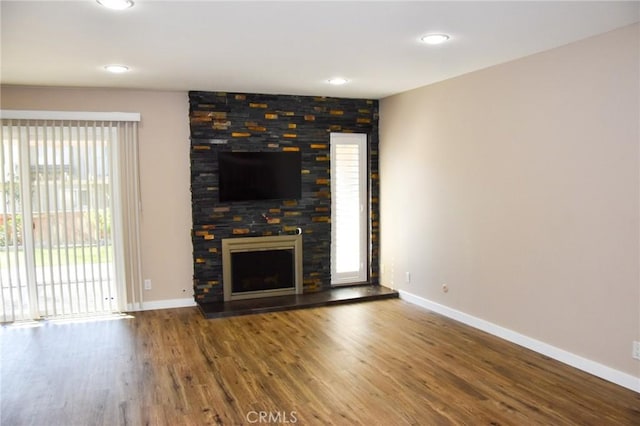 6584 E Paseo Diego, Anaheim, CA 92807 - unfurnished living room featuring wood finished floors, a fireplace, and recessed lighting