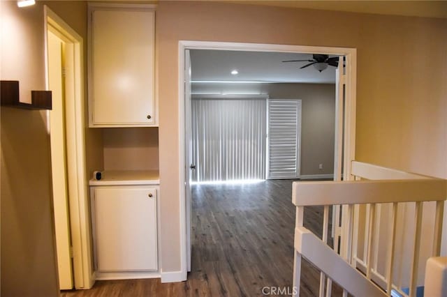 6584 E Paseo Diego, Anaheim, CA 92807 - corridor featuring dark wood-type flooring, an upstairs landing, and recessed lighting