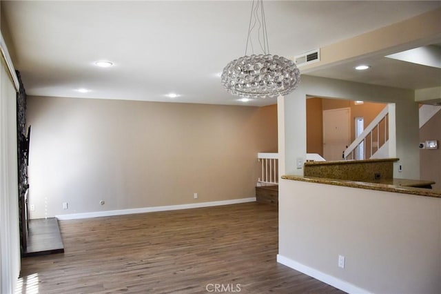 6584 E Paseo Diego, Anaheim, CA 92807 - unfurnished living room with wood finished floors, stairway, recessed lighting, and a chandelier