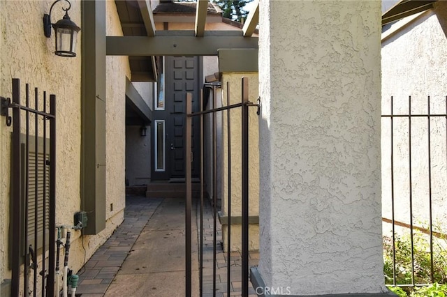 6584 E Paseo Diego, Anaheim, CA 92807 - entrance to property with stucco siding and a gate