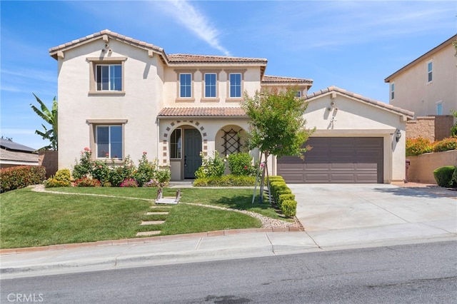 11462 Jacobsen Rd, Beaumont, CA 92223 - mediterranean / spanish-style house with stucco siding, a tile roof, a garage, driveway, and a front yard