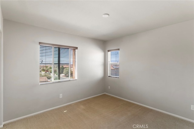 11462 Jacobsen Rd, Beaumont, CA 92223 - spare room featuring light colored carpet and baseboards