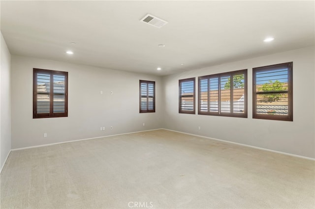 11462 Jacobsen Rd, Beaumont, CA 92223 - unfurnished room with light carpet and recessed lighting