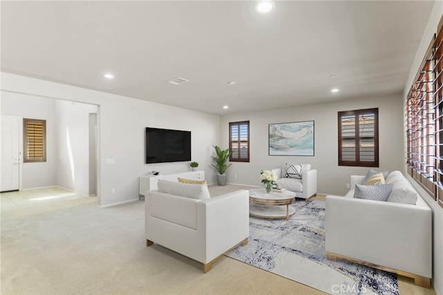 11462 Jacobsen Rd, Beaumont, CA 92223 - living room with recessed lighting, healthy amount of natural light, and light colored carpet