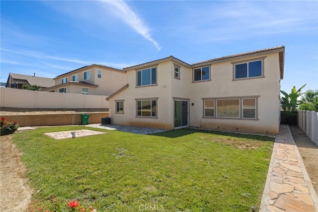 11462 Jacobsen Rd, Beaumont, CA 92223 - back of house featuring a fenced backyard, stucco siding, and a patio area