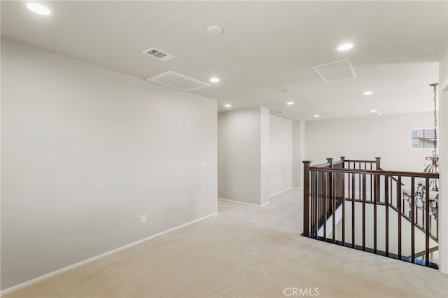 11462 Jacobsen Rd, Beaumont, CA 92223 - spare room with light colored carpet and recessed lighting