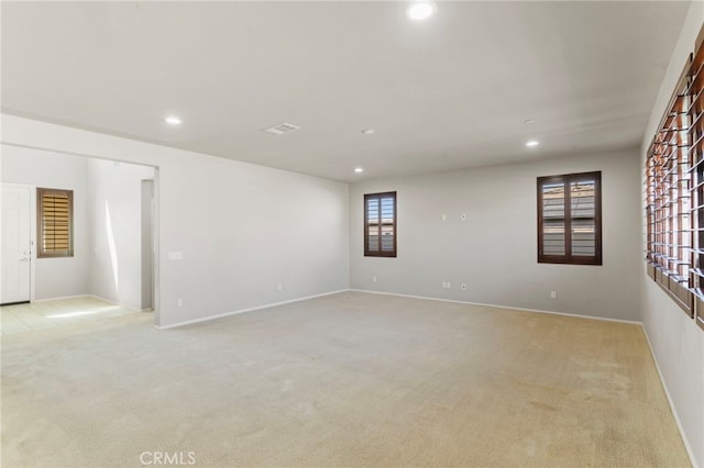 11462 Jacobsen Rd, Beaumont, CA 92223 - spare room featuring recessed lighting and light colored carpet