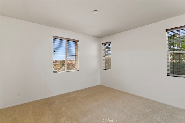 11462 Jacobsen Rd, Beaumont, CA 92223 - empty room with light colored carpet