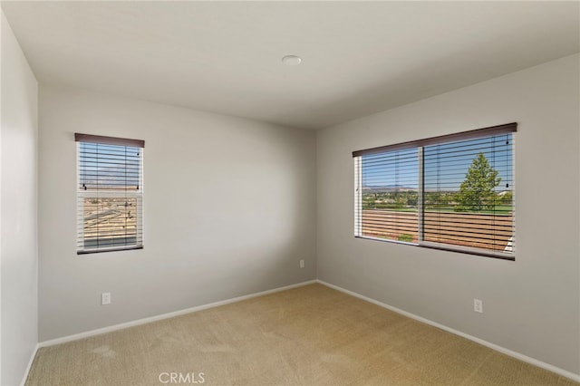 11462 Jacobsen Rd, Beaumont, CA 92223 - unfurnished room featuring light carpet and healthy amount of natural light