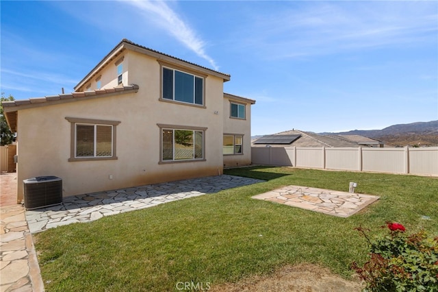 11462 Jacobsen Rd, Beaumont, CA 92223 - rear view of property with stucco siding, a patio, a tiled roof, and a mountain view