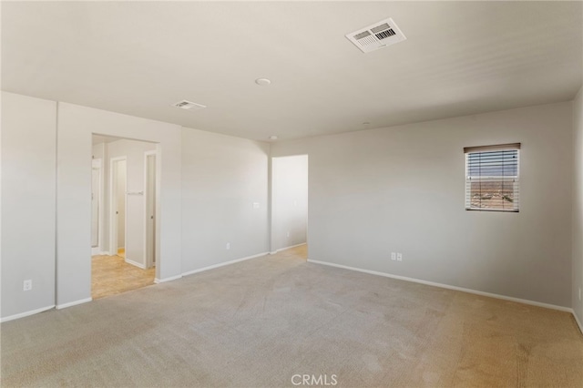 11462 Jacobsen Rd, Beaumont, CA 92223 - spare room featuring light carpet and baseboards