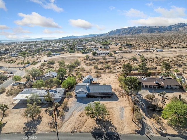 7423 Palomar Ave, Yucca Valley, CA 92284 - aerial view of sparsely populated area featuring a mountain backdrop
