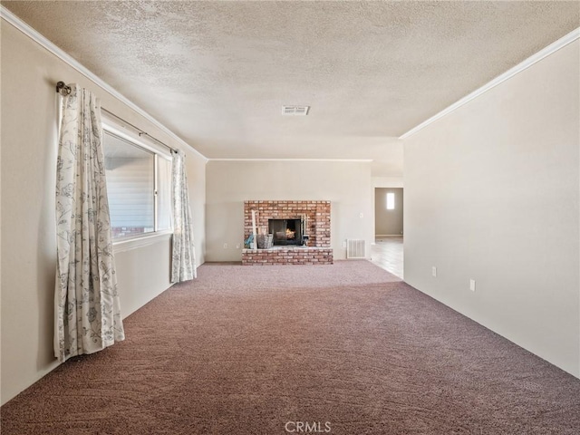 7423 Palomar Ave, Yucca Valley, CA 92284 - unfurnished living room with carpet flooring, a textured ceiling, ornamental molding, and a fireplace