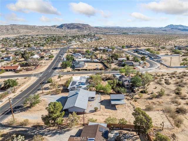 7423 Palomar Ave, Yucca Valley, CA 92284 - aerial perspective of suburban area featuring a mountainous background