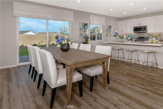 9031 Carson Ave, Hesperia, CA 92344 - dining space featuring light wood-style flooring and recessed lighting