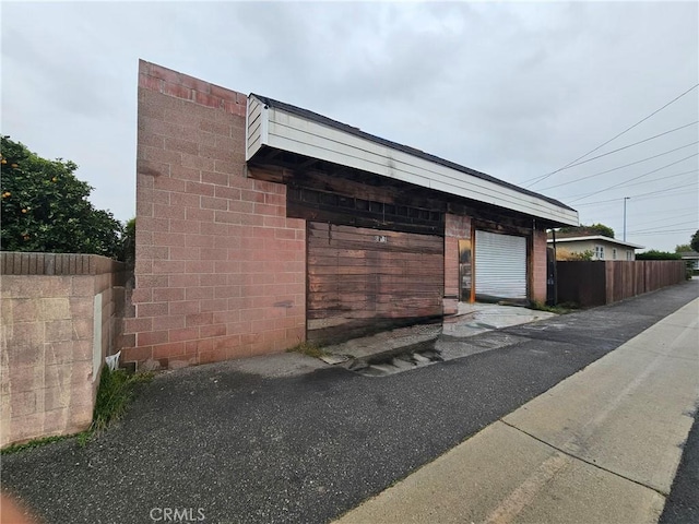 18119 S Denker Ave, Gardena, CA 90248 - view of side of home with a garage
