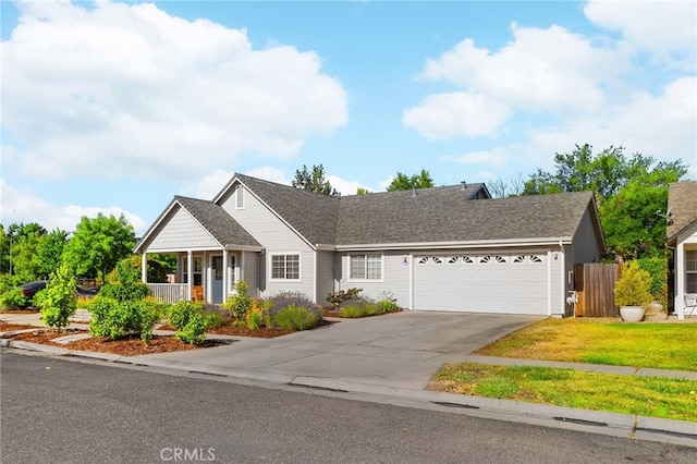1 Alden Ct, Chico, CA 95973 - view of front of property featuring a garage, concrete driveway, and a porch