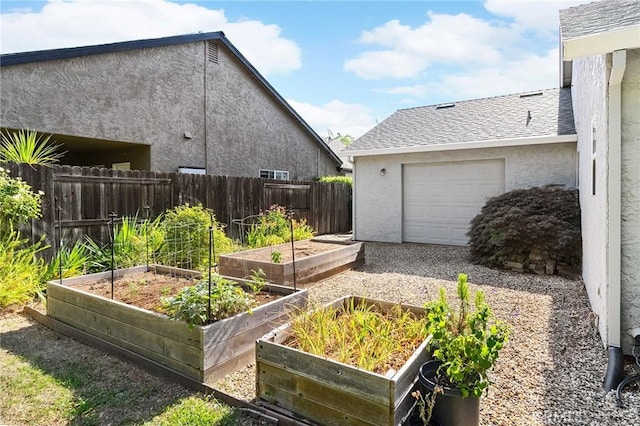 1 Alden Ct, Chico, CA 95973 - view of yard featuring a garden and a garage