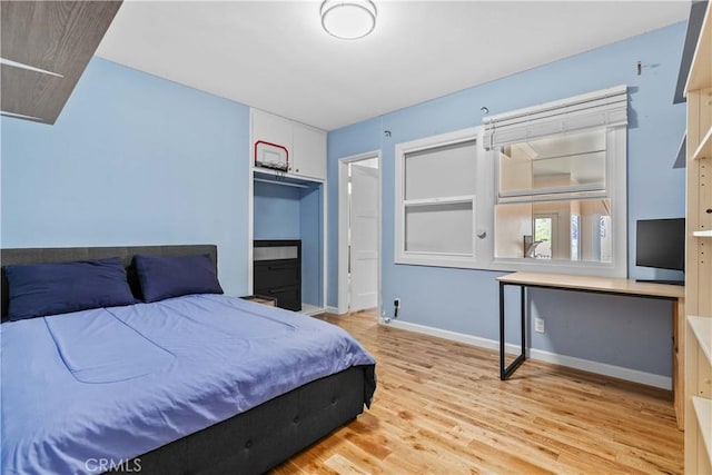 3348 Burritt Way, La Crescenta, CA 91214 - bedroom with light wood-style flooring and baseboards