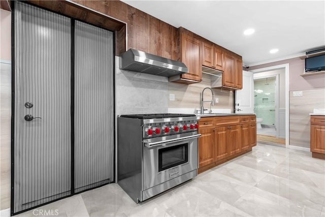 3348 Burritt Way, La Crescenta, CA 91214 - kitchen with designer range, wall chimney range hood, light countertops, light marble finish floors, and ornamental molding