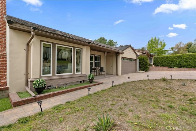 3348 Burritt Way, La Crescenta, CA 91214 - view of front of property with concrete driveway, a garage, and stucco siding