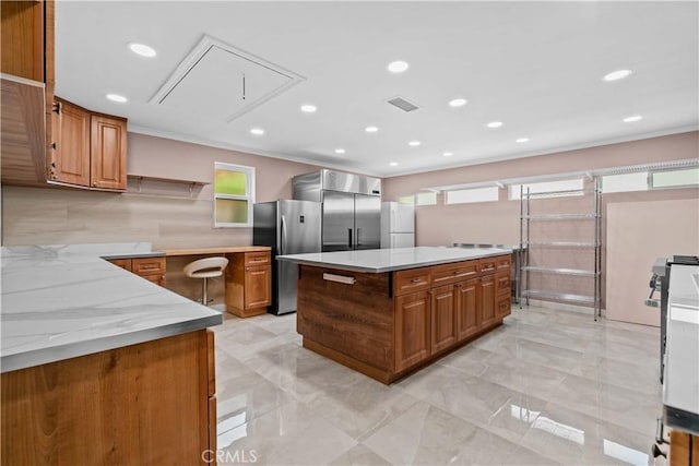 3348 Burritt Way, La Crescenta, CA 91214 - kitchen with freestanding refrigerator, brown cabinetry, open shelves, recessed lighting, and light marble finish flooring