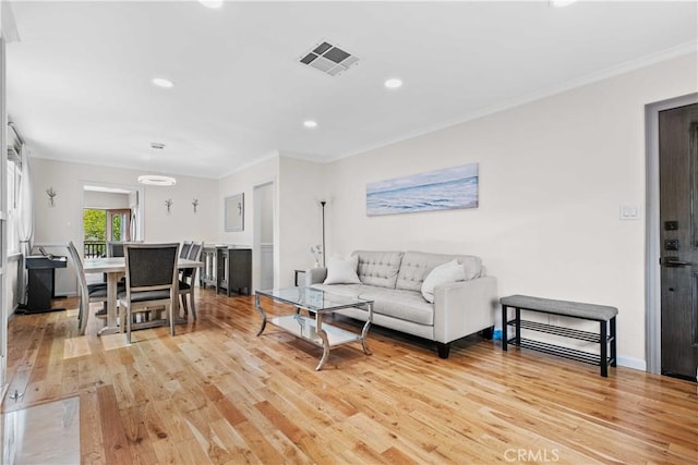 3348 Burritt Way, La Crescenta, CA 91214 - living area featuring light wood finished floors, recessed lighting, and crown molding