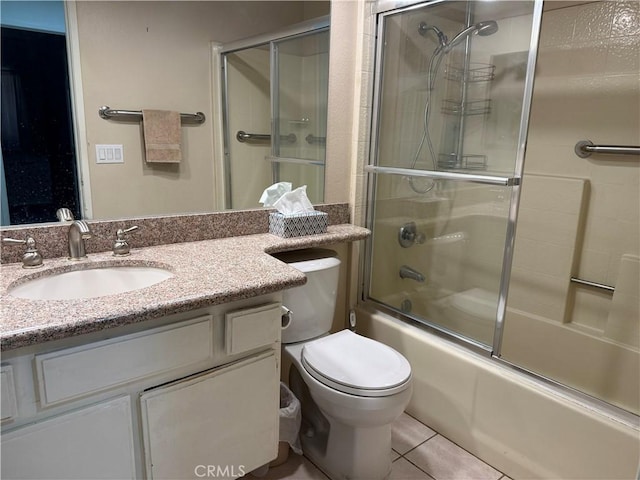 23020 Jensen Ct, Grand Terrace, CA 92313 - bathroom featuring vanity, tile patterned flooring, and enclosed tub / shower combo