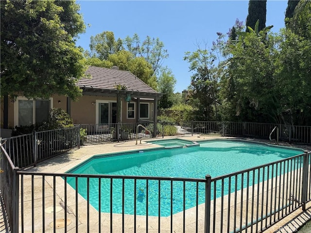 23020 Jensen Ct, Grand Terrace, CA 92313 - view of pool with a patio and a pool with connected hot tub