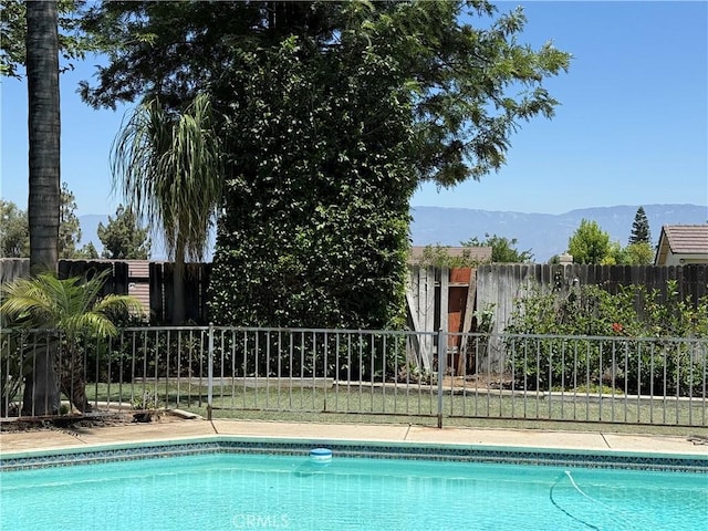 23020 Jensen Ct, Grand Terrace, CA 92313 - view of swimming pool with a mountain view