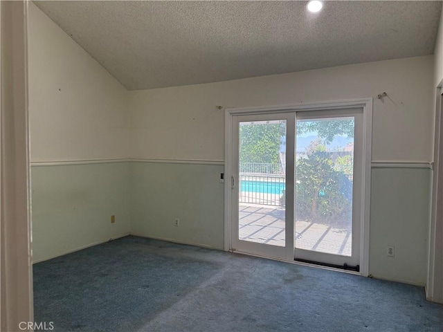 23020 Jensen Ct, Grand Terrace, CA 92313 - unfurnished room featuring carpet and a textured ceiling