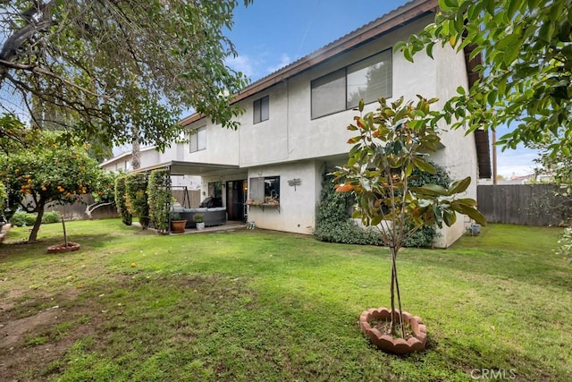 7826 Winnetka Ave, Winnetka, CA 91306 - back of property with a fenced backyard and stucco siding