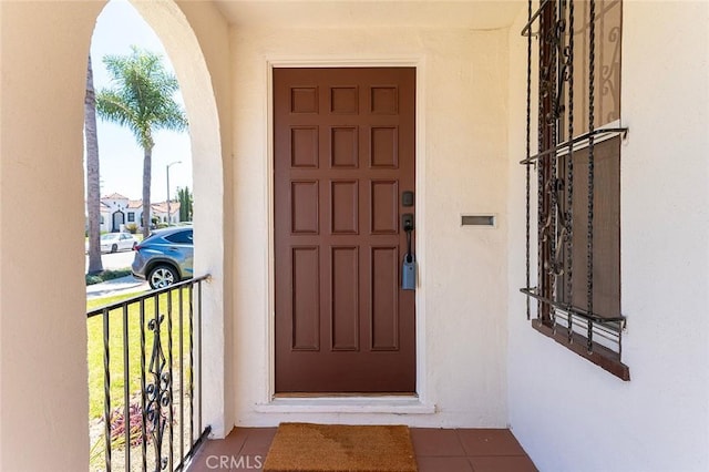 1123 W 81st St, Los Angeles, CA 90044 - view of exterior entry featuring stucco siding