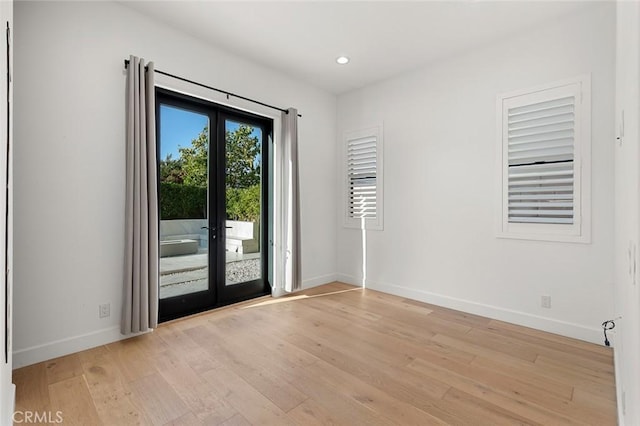 10413 Saint Anna Pl, Fountain Valley, CA 92708 - doorway to outside featuring light wood-style floors, recessed lighting, and french doors