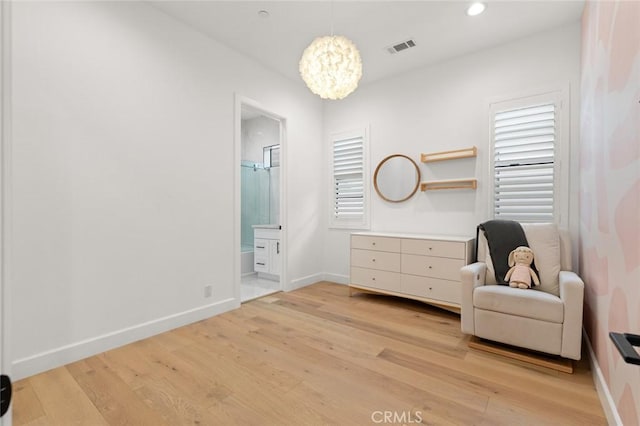 10413 Saint Anna Pl, Fountain Valley, CA 92708 - living area with a chandelier, light wood-style floors, and recessed lighting