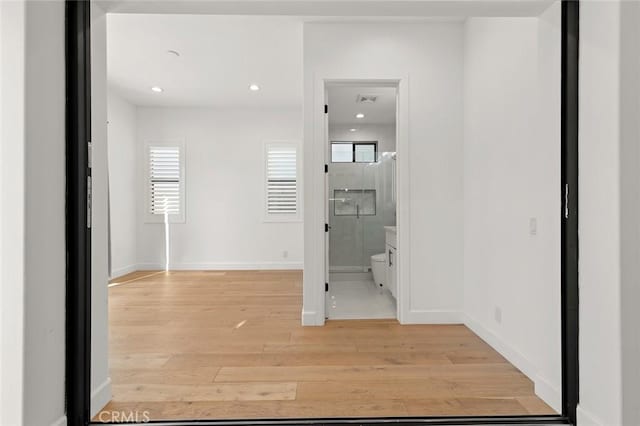 10413 Saint Anna Pl, Fountain Valley, CA 92708 - hall featuring light wood finished floors and recessed lighting