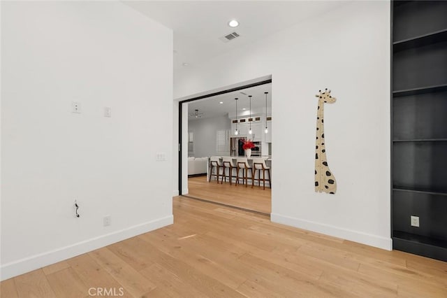 10413 Saint Anna Pl, Fountain Valley, CA 92708 - unfurnished room with light wood finished floors and recessed lighting