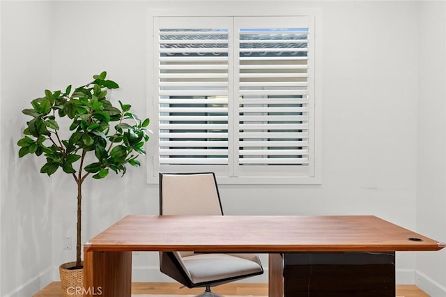 10413 Saint Anna Pl, Fountain Valley, CA 92708 - home office featuring baseboards and wood finished floors