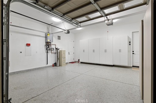 10413 Saint Anna Pl, Fountain Valley, CA 92708 - garage with a garage door opener