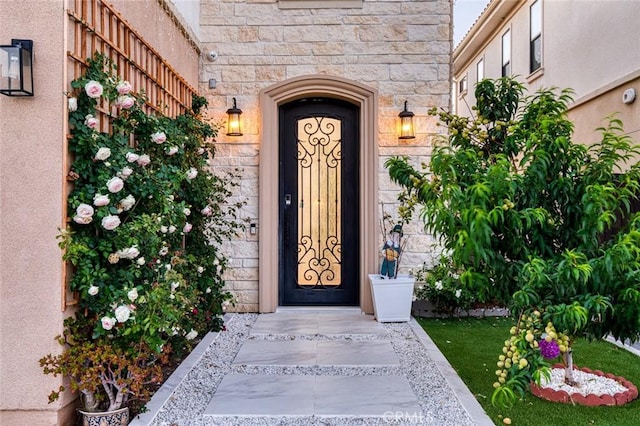 10413 Saint Anna Pl, Fountain Valley, CA 92708 - entrance to property with stone siding and a security system