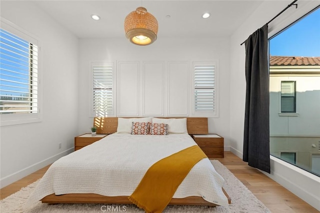 10413 Saint Anna Pl, Fountain Valley, CA 92708 - bedroom with light wood finished floors and recessed lighting