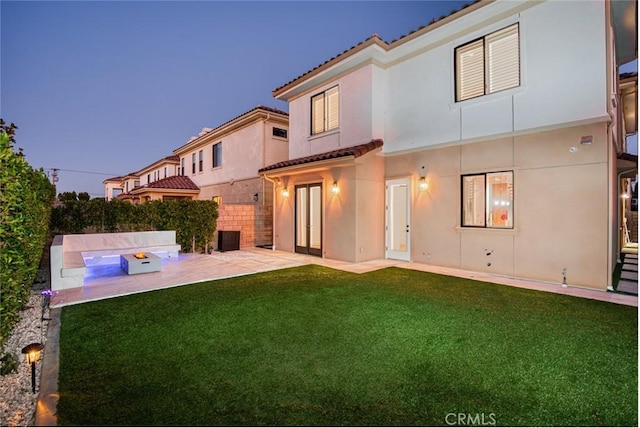 10413 Saint Anna Pl, Fountain Valley, CA 92708 - back of property featuring a tile roof, a patio, a yard, and stucco siding