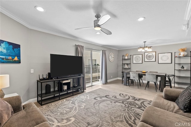 5230 Zelzah Ave Unit 3, Encino, CA 91316 - living room with a ceiling fan, wood finished floors, ornamental molding, a chandelier, and recessed lighting