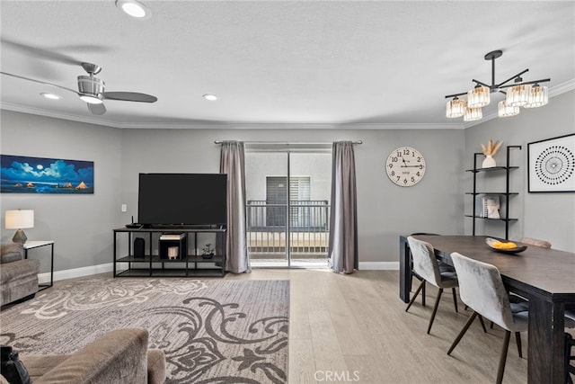 5230 Zelzah Ave Unit 3, Encino, CA 91316 - living room featuring crown molding, wood finished floors, a chandelier, recessed lighting, and a ceiling fan